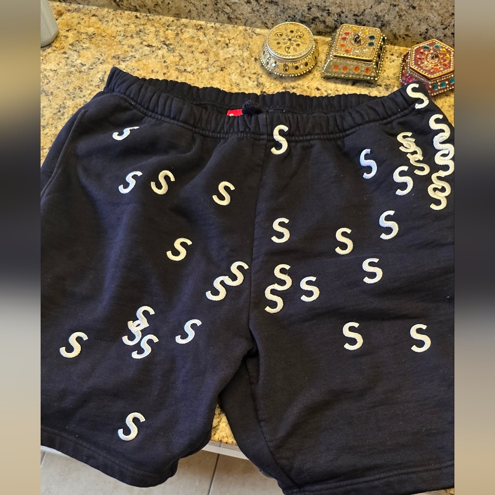 Supreme Black and White Athletic Shorts with Iconic Pattern